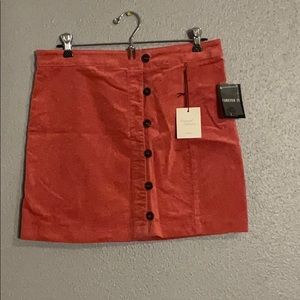 Forever 21 rose colored button up skirt